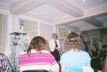 Audience looks on while Carolyn gives messages from loved ones who have crossed over